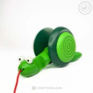 Wooden Snail Pull Along Toy - Eco-friendly, handcrafted Channapatna toy with a whimsical design, perfect for imaginative play and skill development.