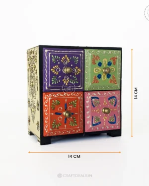 Vintage-style wooden chest with four drawers and handpainted design. Ideal for bedroom, living room, or entryway storage.
