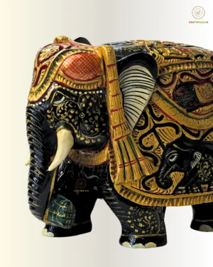 Handcrafted wooden elephant figurine in royal black & gold