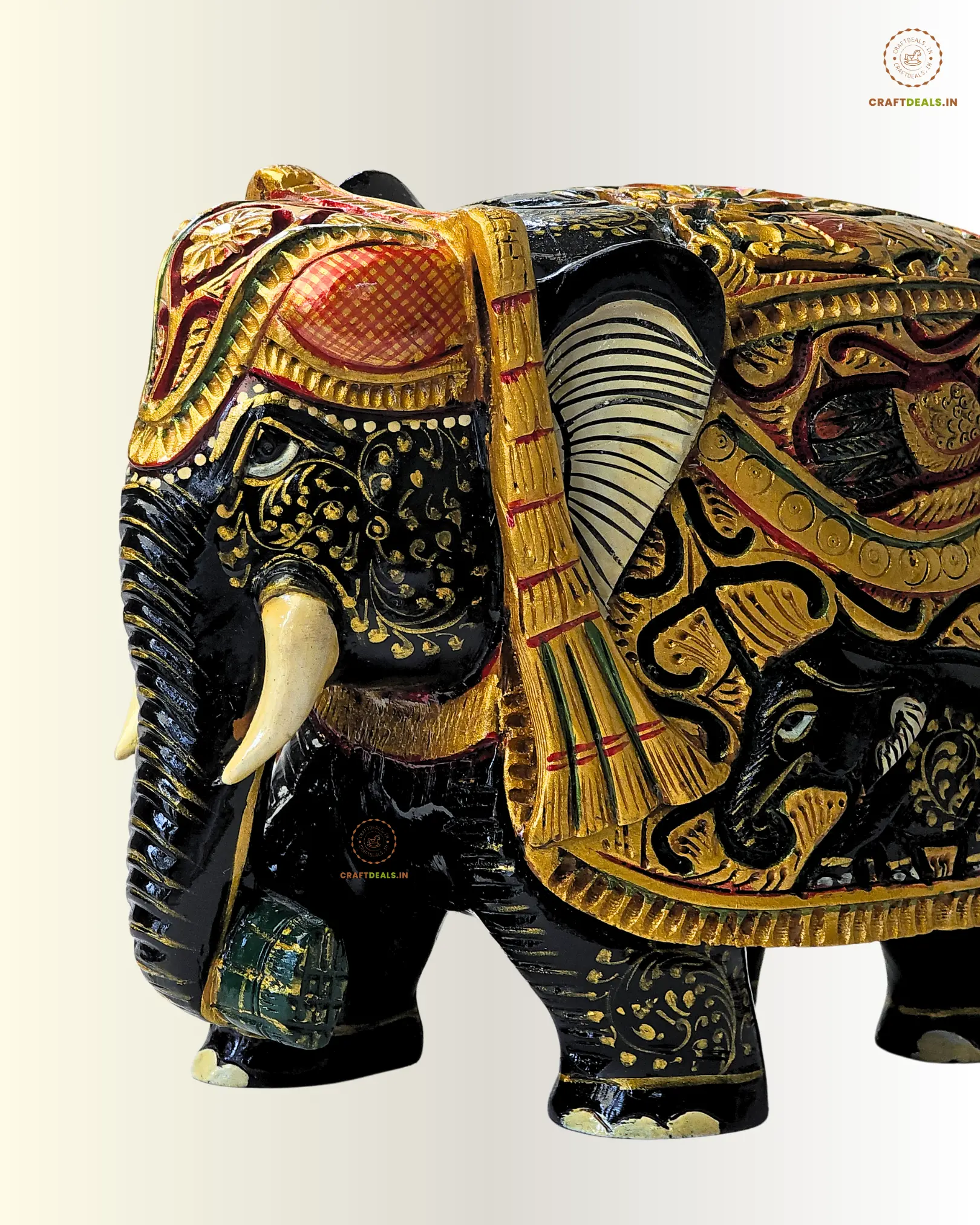 Handcrafted wooden elephant figurine in royal black & gold